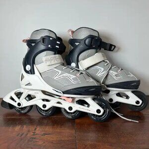 Pair of Oxelo Fit 3 kids' adjustable inline fitnes skates.